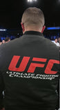 Bomber UFC noir porté de dos avec le logo UFC
