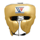 Casque de boxe Winning FG-2900 or, vue de face, protections pommettes et écusson Winning