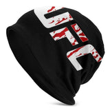 Bonnet UFC noir au sigle blanc éclaboussé de rouge, vue de trois quarts