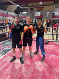 Champion de boxe belge à l'entraînement avec les gants de sparring Esprit Boxe orange