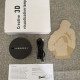 Veilleuse boxeur LED, contenu du colis : socle, câble USB, plaque et notice