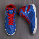 Chaussures de boxe bleu roi vues de dessus, lacets rouges