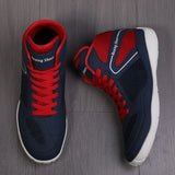 Chaussures de boxe bleu marine vues de dessus, lacets rouges