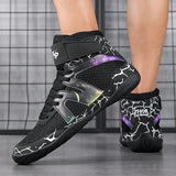Chaussures de boxe noires à motif galaxie argent portées en salle