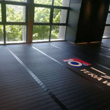 Tapis Flexi-Roll posés et reliés par bandes velcro périphériques