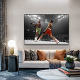 Tableau Ali vs Joe Frazier, photo noir et blanc a rehauts rouge et vert, affiche dans un salon