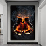 Tableau paire de gants de boxe en flammes, braises et fumee sur fond noir