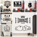 Les sept motifs de stickers boxe posés en situation dans une salle d'entraînement