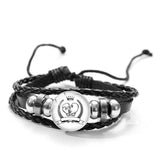 Bracelet boxe à bouton pression, motif 6 : deux gants blancs dans une couronne de laurier surmontée d'une couronne