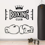 Sticker Boxing Club et gants de boxe posé à côté d'un sac de frappe