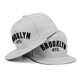 Casquette Brooklyn gris chiné, lettrage BROOKLYN NYC brodé noir