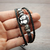 Bracelet boxe à bouton pression : vue d'ensemble du bracelet noir