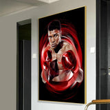 Tableau Mohamed Ali en garde dans un tourbillon rouge sur fond noir, affiche dans un salon
