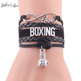Bracelet boxe multirangs noir porté au poignet, breloque gant suspendue
