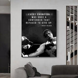 Tableau citation Rocky Balboa et photographie de combat en noir et blanc, affiche dans un salon
