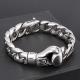 Bracelet gourmette gant de boxe argent présenté en vitrine de bijoutier