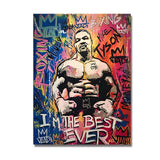 Tableau Mike Tyson sur mur de graffitis avec couronnes et phrase blanche, accroche dans une entree