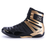 Chaussure de boxe Sting Viper noir et or, vue de profil