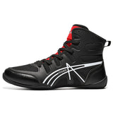 Chaussure de boxe anglaise noire et rouge, vue de profil