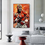 Tableau Floyd Mayweather en garde, fond peint orange et rouge, accroche dans une entree