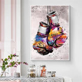 Tableau gants de boxe suspendus peints a l'aquarelle multicolore, vue rapprochee de la toile