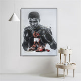 Tableau Mohamed Ali noir et blanc, portrait, gants et scene Ali vs Liston, accroche dans une entree