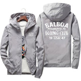 Coupe-vent Rocky Balboa gris, marquage blanc au dos