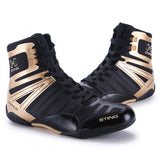 Chaussures de boxe Sting Viper noir et or, la paire de face