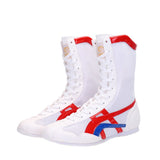 Bottes de boxe blanc, rouge et bleu, la paire vue de face