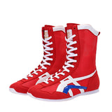 Bottes de boxe rouge, blanc et bleu en toile, la paire de face