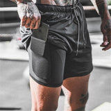 Short 2 en 1 homme look sport