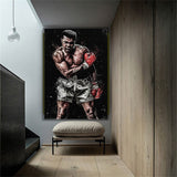 Tableau Cassius Clay en garde sur fond noir, gants rouges, accroche dans une entree