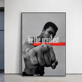 Tableau Mohamed Ali be the greatest, poing nu tendu vers l'objectif, bandeau rouge, accroche dans une entree