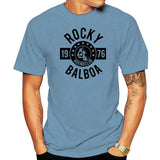 T-shirt Rocky Balboa Boxing Club bleu ciel, écusson circulaire noir