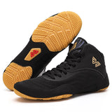 Chaussures de boxe noir et or, semelle gomme caramel