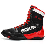 Chaussure de boxe vernie noir et rouge, vue de profil