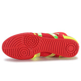 Semelle rouge de chaussure de boxe, disques de pivot concentriques