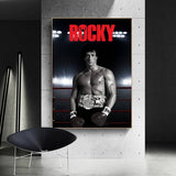 Tableau Rocky Balboa debout dans le ring, ceinture de champion a la taille, affiche dans un salon