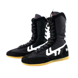 Bottes de boxe noires à bout suédé, semelle gomme caramel