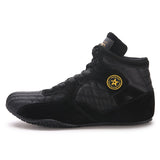 Chaussure de boxe noire de profil, empiècements aspect daim
