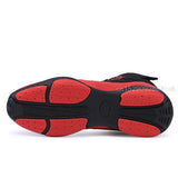 Semelle noire à larges plaques rouges, chaussure de boxe rouge