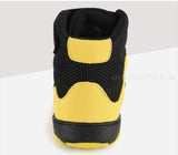 Chaussure de boxe jaune et noire vue arrière, contrefort et talon
