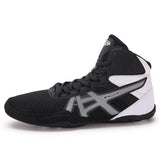 Chaussure de boxe noire et blanche de profil, talon blanc