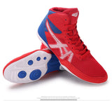 Semelle blanche à pastilles de pivot bleues, chaussure de boxe rouge