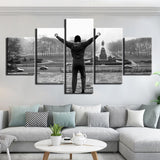 Tableau au style Rocky Balboa 5 pièces, bras levés en haut de l'escalier