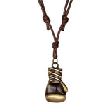 Pendentif gant de boxe finition bronze vieilli sur cordon tressé marron à nœuds coulissants