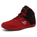 Chaussure de boxe rouge et noire de profil, double chevron blanc