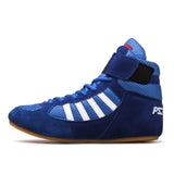 Chaussure de boxe bleu roi de profil, sangle scratch et semelle gomme