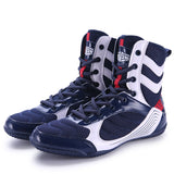 Chaussures de boxe bleu marine, blanc et rouge, la paire de profil