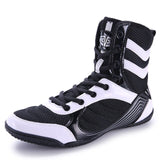 Chaussure de boxe noir et blanc, empiècement mesh latéral